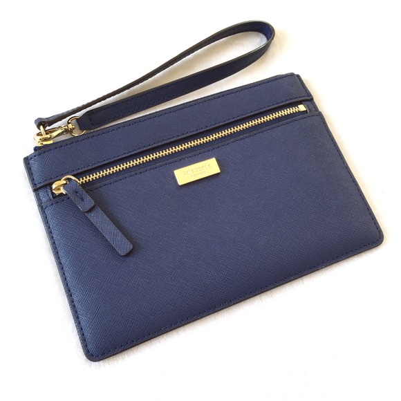 kate spade Handbags - Kate Spade Newbury Lane Tinie Wristlet Indigo Blue